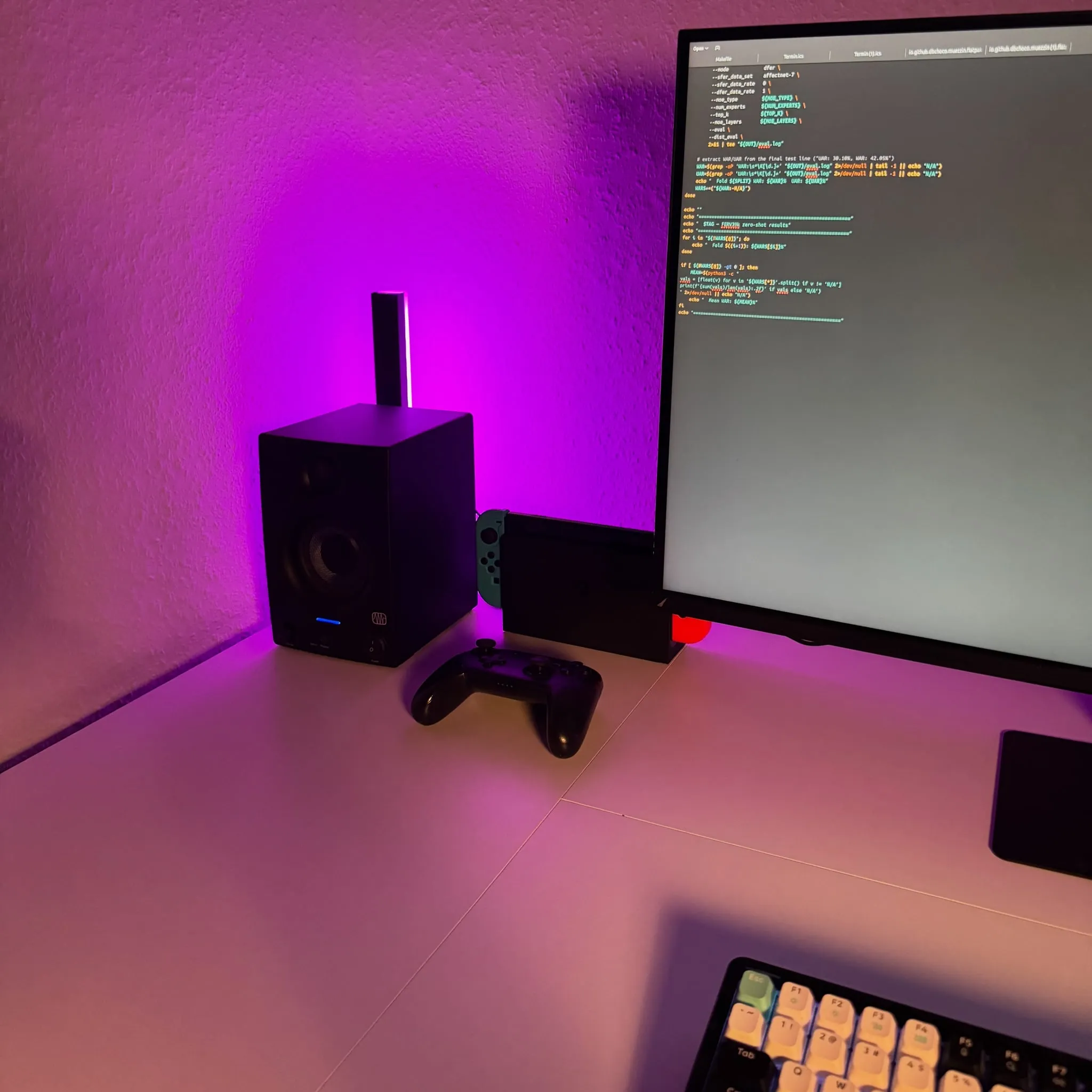 The fun corner: Eris monitor, RGB bar, and the Switch dock